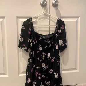 Black romper with floral design